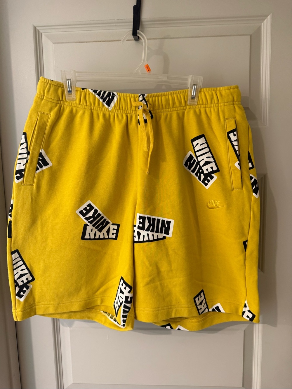 Nike Men’s Yellow Logo-Print Swim Trunks